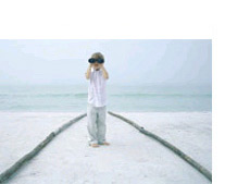 Boy looking into telescope